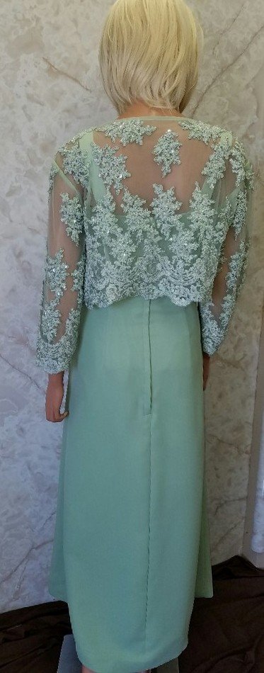 green mothers dress and jacket